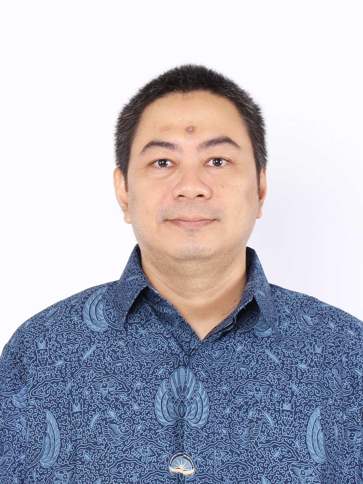 Wimpie Yustino Setiawan, S.E., M.Comm., MPA.